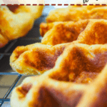 A close up image of a paleo sweet potato waffle on a cooling rack.
