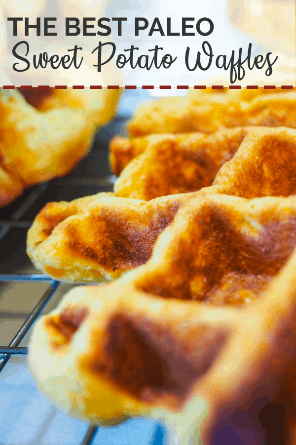 A close up image of a paleo sweet potato waffle on a cooling rack.