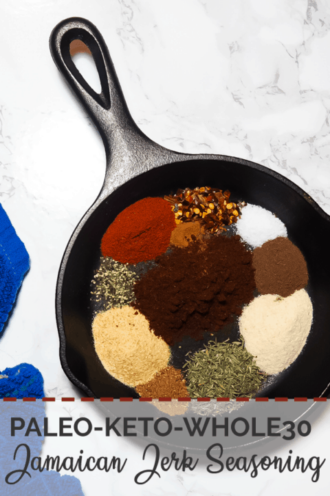 A pin image of a small cast iron pan with the unmixed ingredients for making Jamaican Jerk Seasoning and a blue dish cloth.