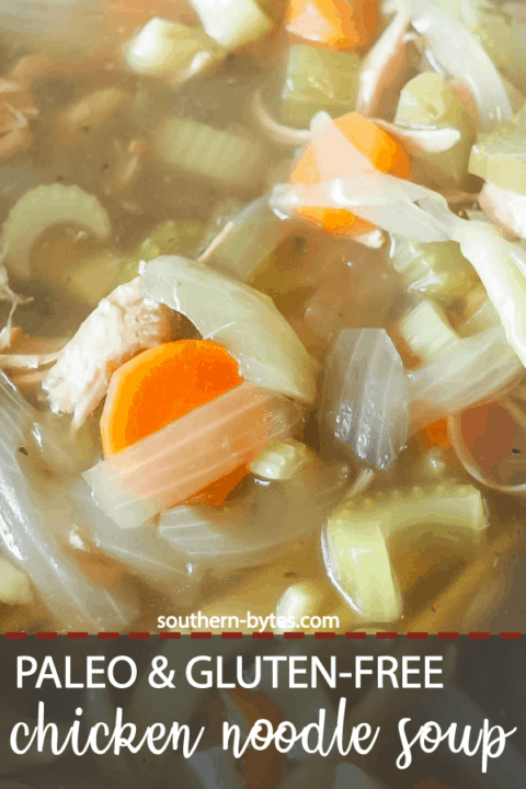 A pin image of a zoomed in bowl of paleo chicken noodle soup.