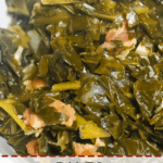 A pin image of a white bowl of collard greens with bits of bacon.