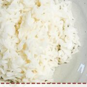 A pin image of a bowl of white rice.