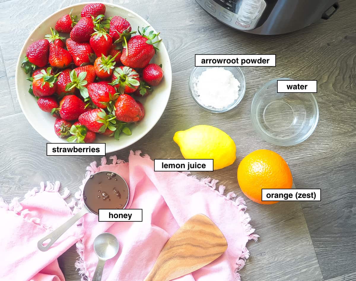 A picture of the ingredients in paleo strawberry jam made in an Instant Pot, labeled.