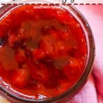 A pin image of a jar of paleo strawberry jam.
