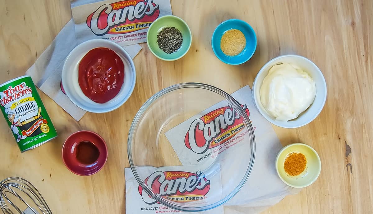 The ingredients in Raising Cane's sauce in small bowls.