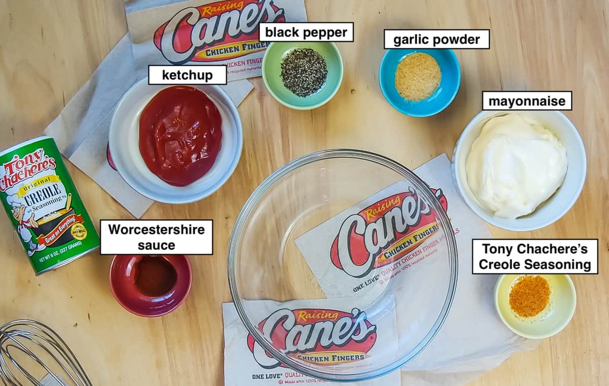 A picture of the ingredients in Raising Cane's sauce in small bowls, labeled.