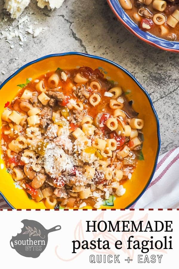 a pin image of a blue and yellow bowl of pasta e fagioli