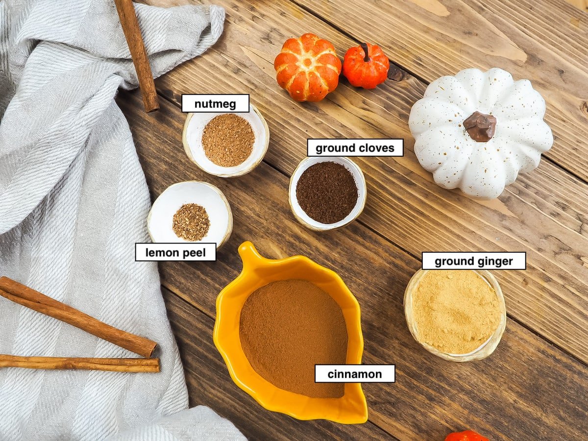 a picture of the ingredients in pumpkin pie spice in little bowls, labeled.
