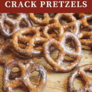 A pin image of crack pretzels spread out on a wooden board.