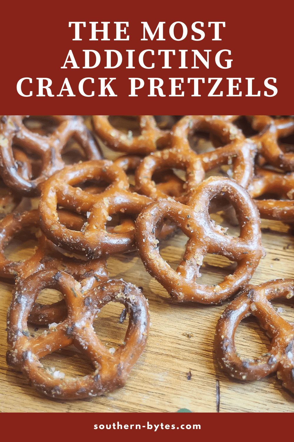 A pin image of crack pretzels spread out on a wooden board.