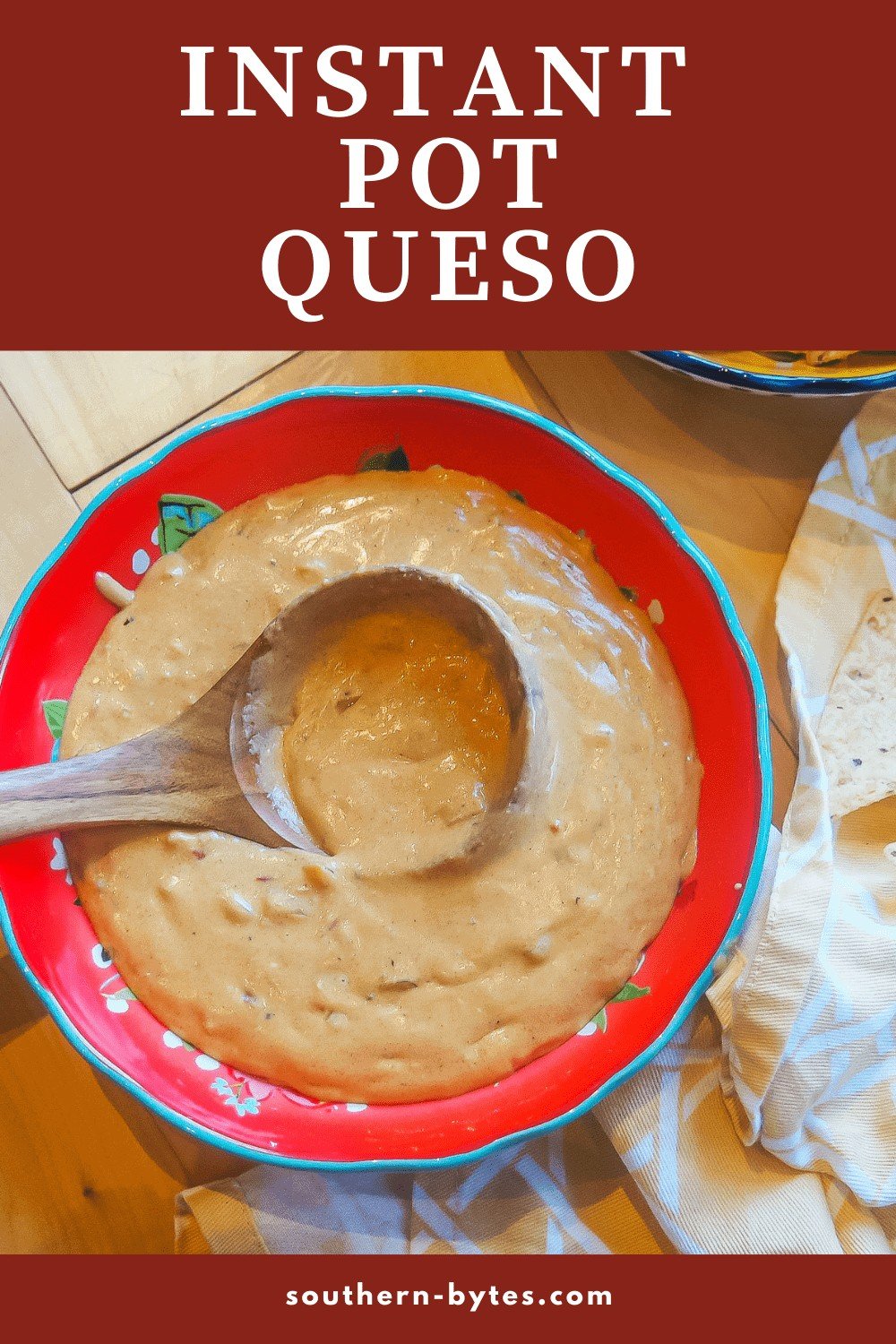 A pin image of a red bowl filled with instant pot queso with chips and a wooden spoon.