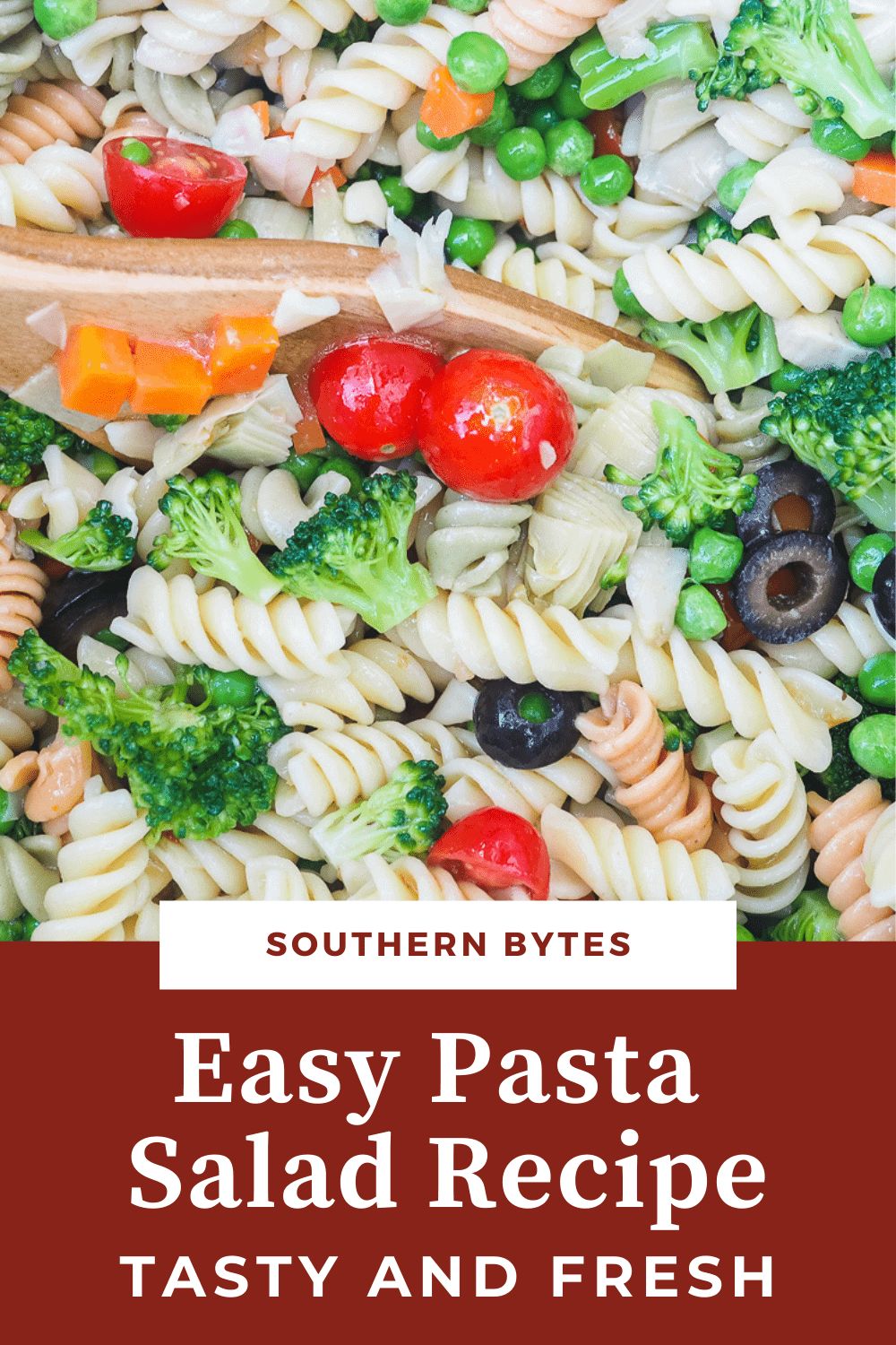 A pin image of a bowl of pasta salad up close.