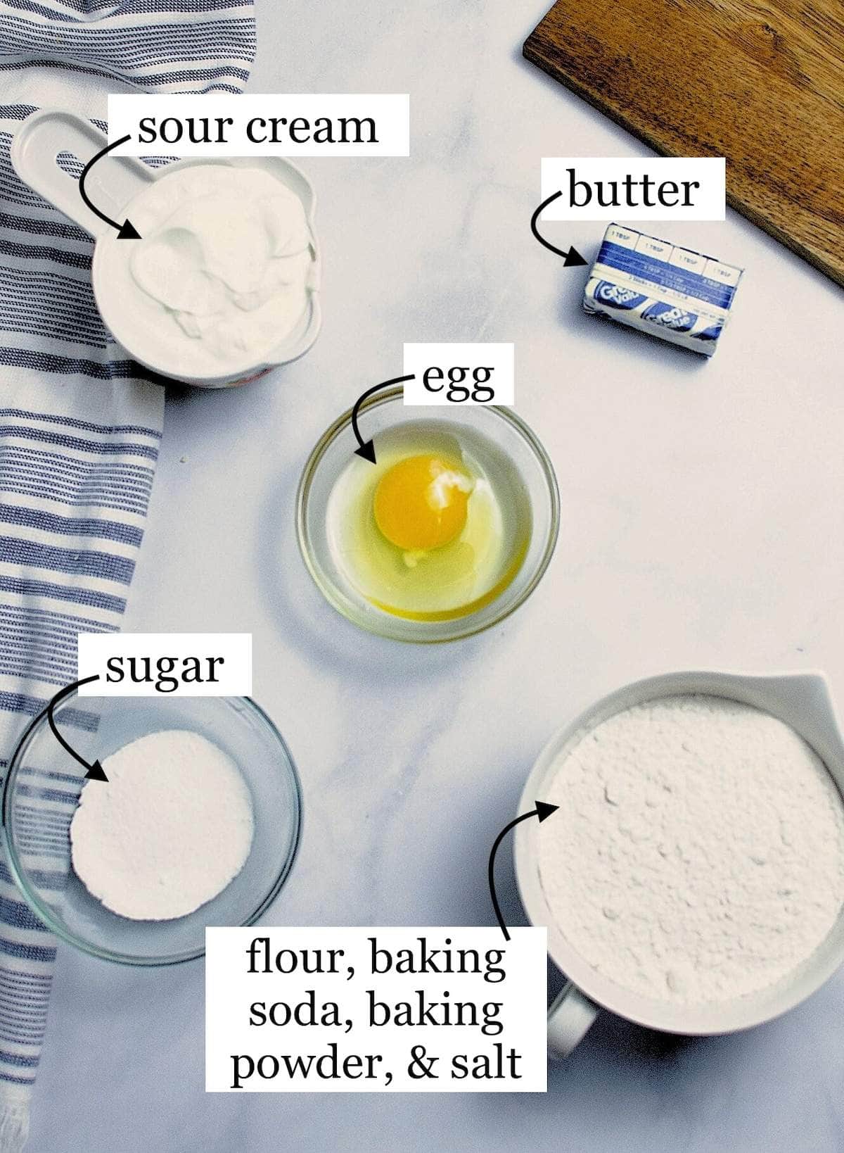 The ingredients in sour cream biscuits, laid out and labled.