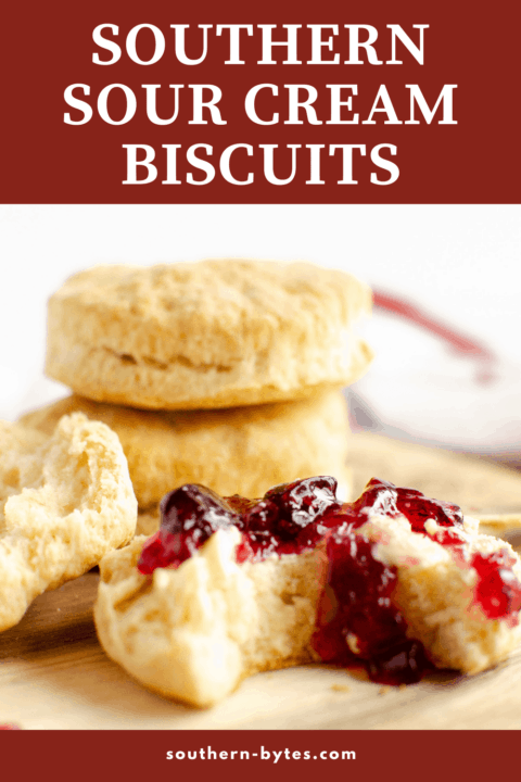 A pin image of a pile of sour cream biscuits, one with jelly on it, with overlay text.