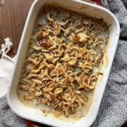 Classic French's green bean casserole covered in crispy onions in a baking dish.