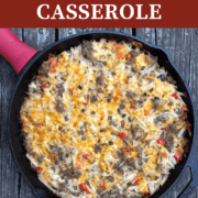 A picture of sausage breakfast casserole in a skillet with overlay text.