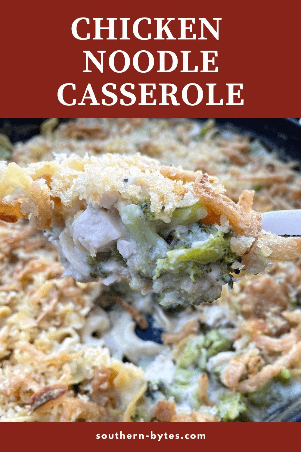 A pin image of a scoop of cheesy chicken noodle casserole being served with overlay text.