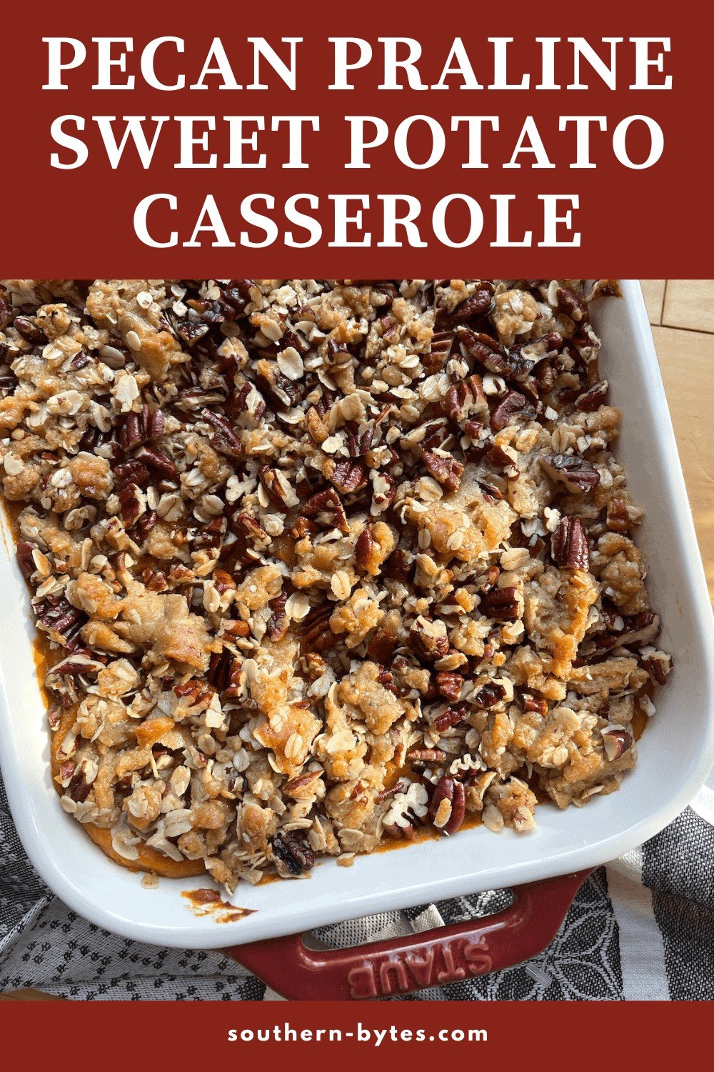 A pin image of a pan of sweet potato casserole with pecan praline topping.