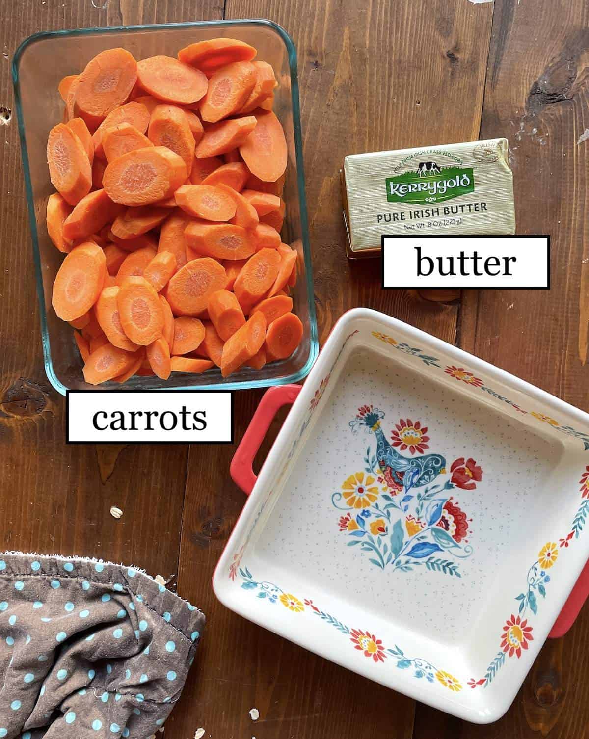 The ingredients in butter roasted carrots, laid out and labeled.