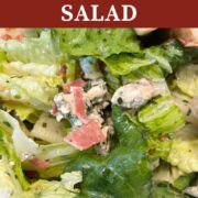 A pin image of royal street salad, zoomed in on blue cheese and bacon.