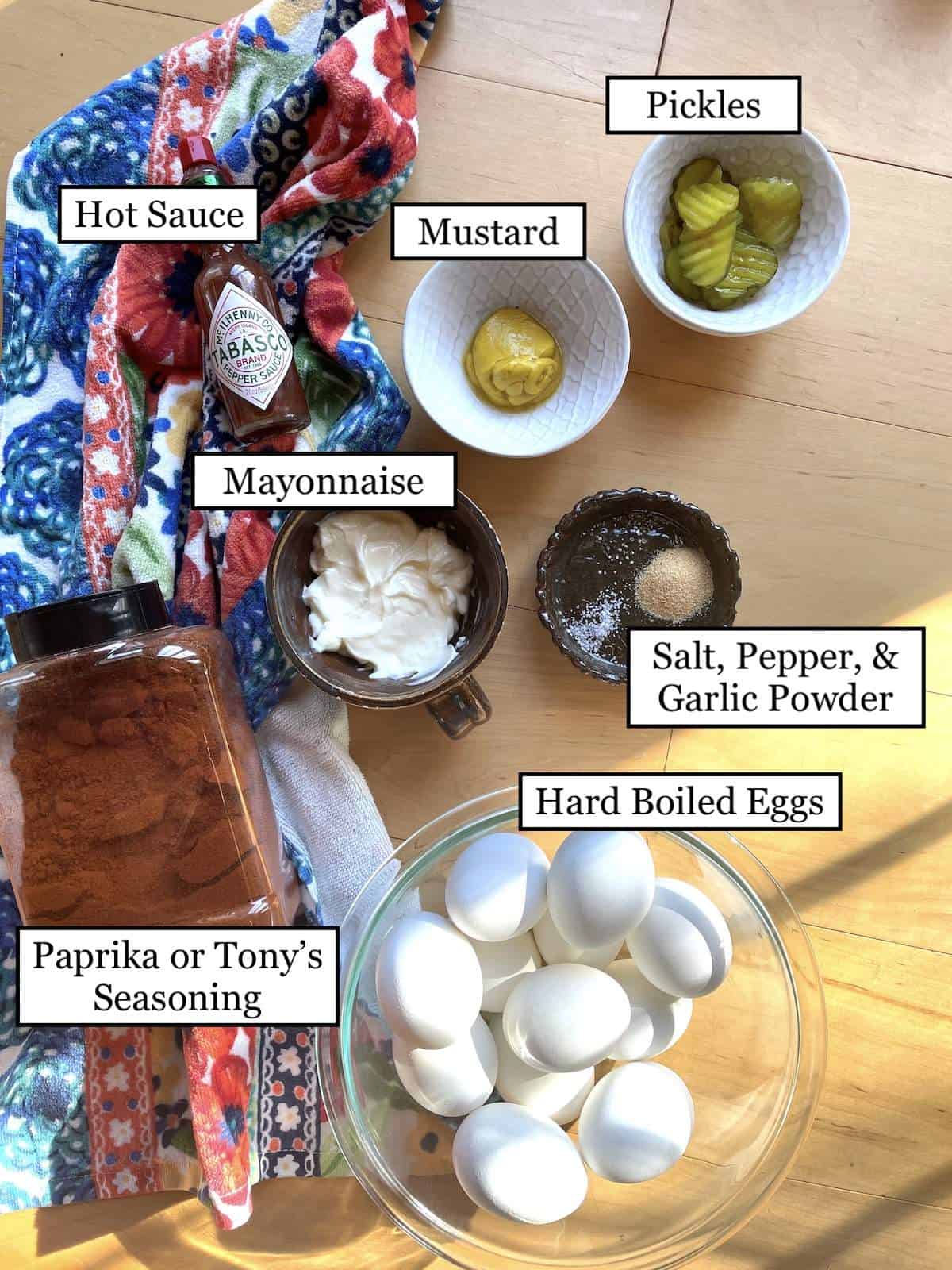 The ingredients in deviled eggs, laid out and labeled.