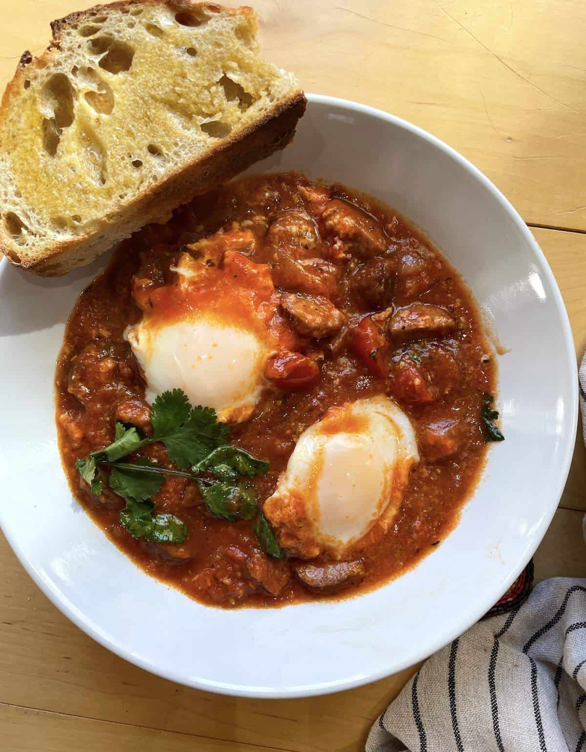 Two eggs in purgatory in a creole tomato sauce.