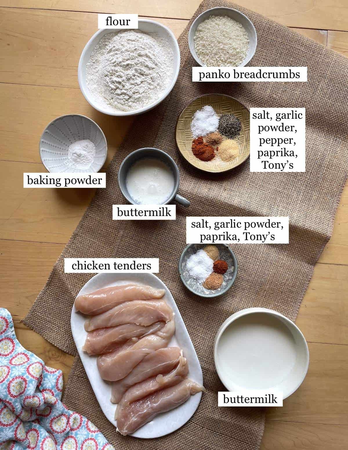 The ingredients in buttermilk fried chicken tenders, laid out and labeled.
