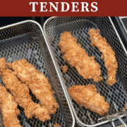 A pin image of crispy fried chicken tenders in the baskets of a deep fryer.
