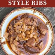 A pin image of a bowl of crock pot country style ribs.