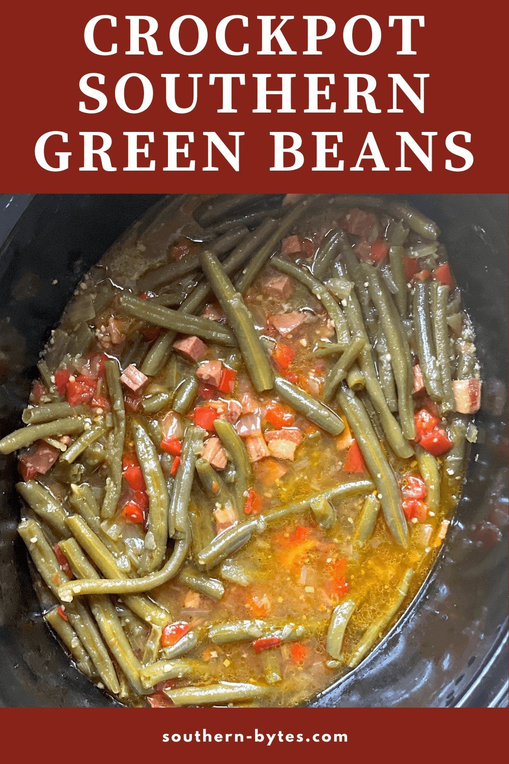 A pin image of southern green beans with ham cooking in a crockpot.