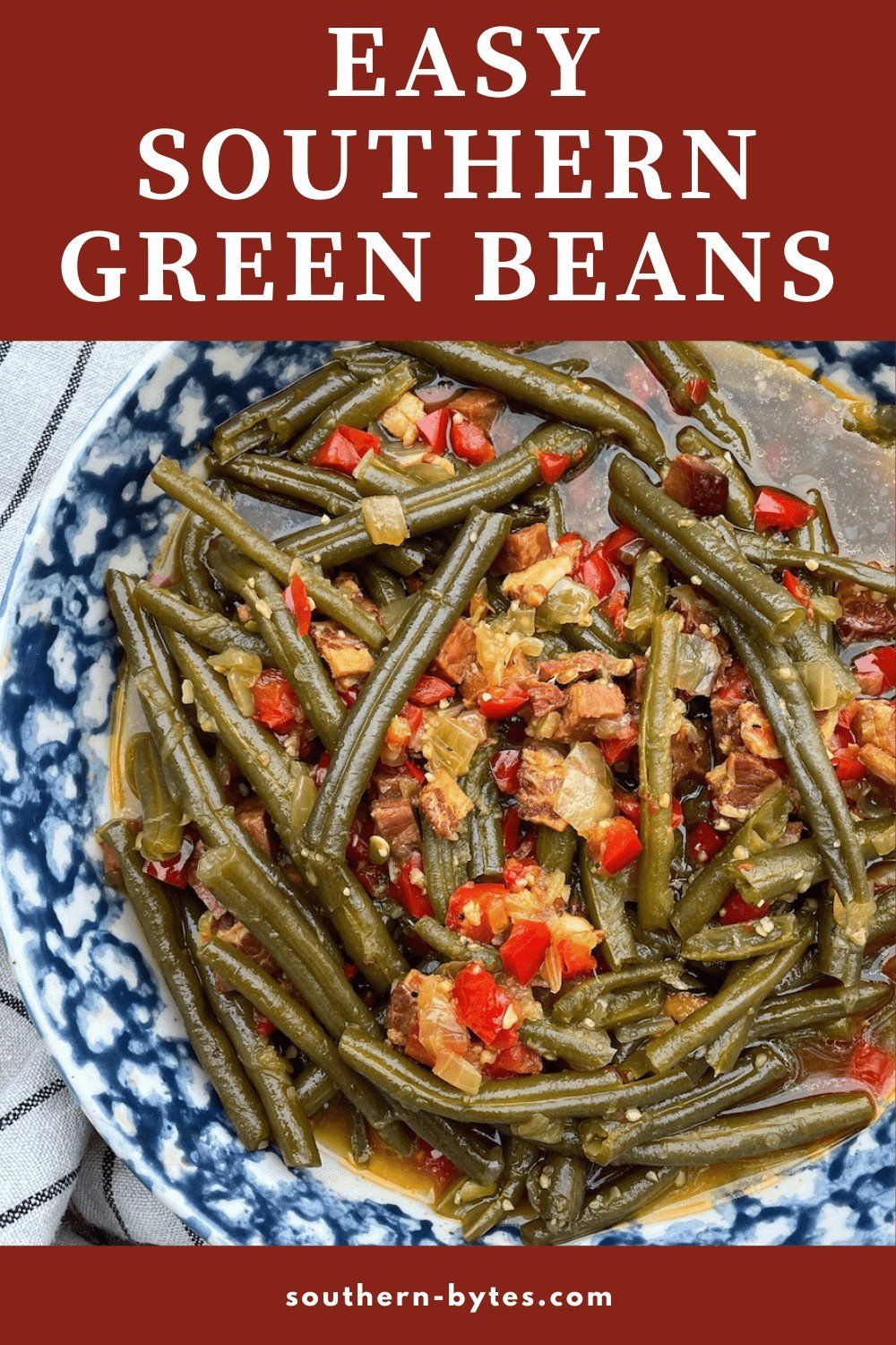 A pin image of a bowl of easy to make southern green beans that were cooked in the crockpot with bacon and a ham hock.