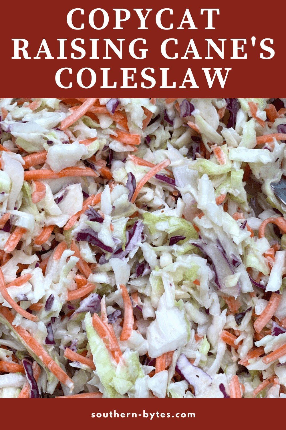 A pin image of copycat Raising Cane's Coleslaw (shredded carrots & cabbage covered in mayonnaise) up close.