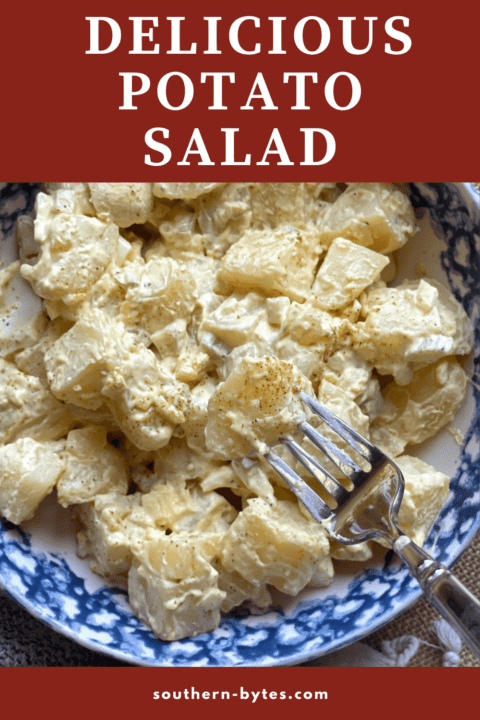 A pin image of a bowl of southern potato salad with celery and pickles.