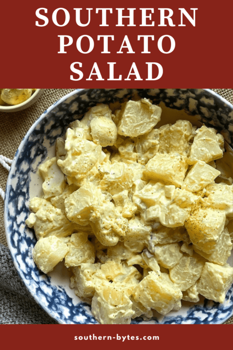 A pin image of a bowl of creamy southern potato salad with mustard based dressing.