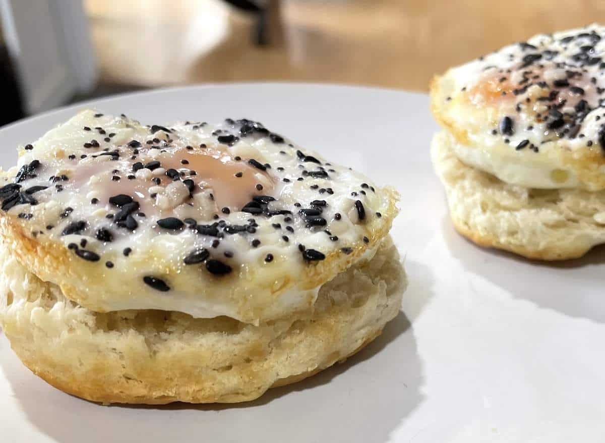 A muffin tin baked egg on a biscuit.