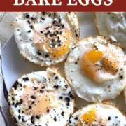 A pin image of eggs baked in a muffin tin on a white plate.