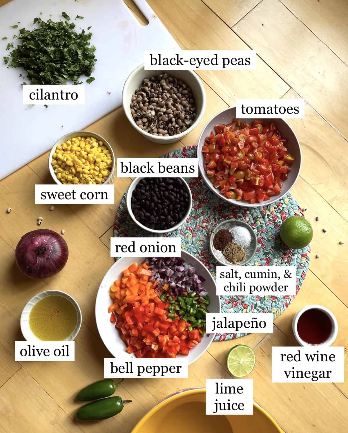 The ingredients in Texas Caviar, diced up and laid out and labeled.