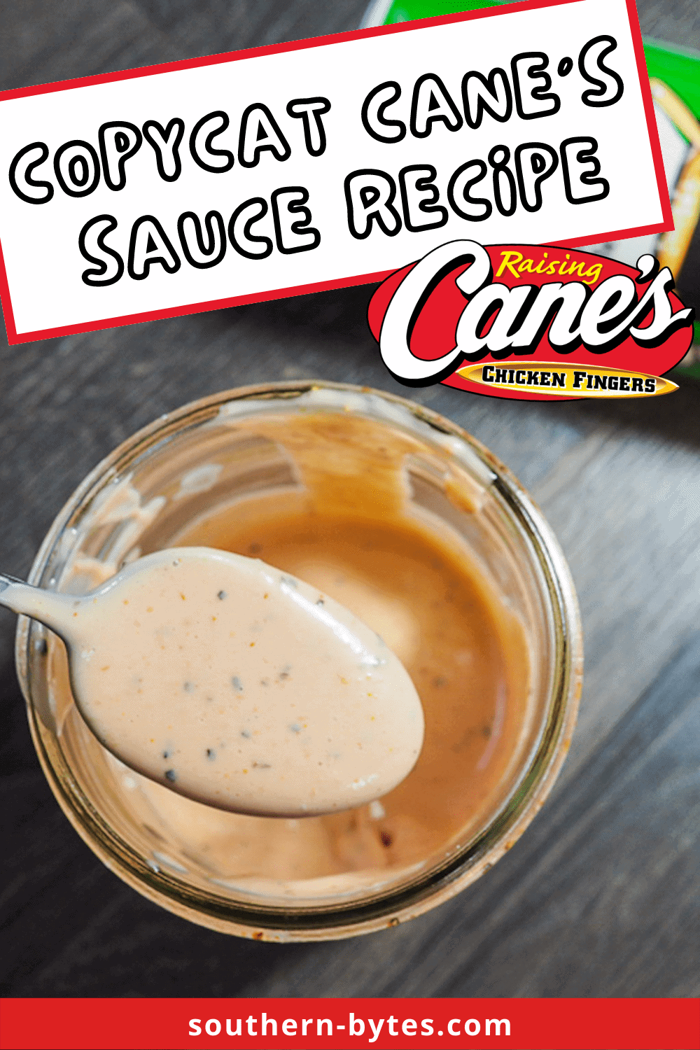 A pin image of Raising Cane's sauce on a spoon dripping into a jar with a can of Tony Chachere's Seasoning in the background.