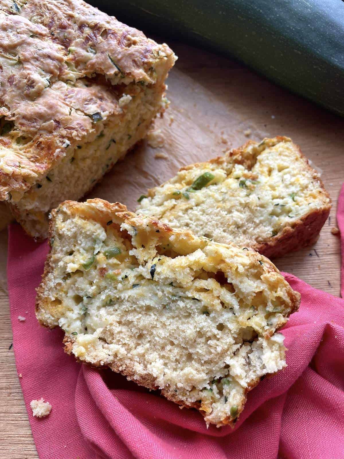Slices of savory cheddar zucchini bread with jalapeños.
