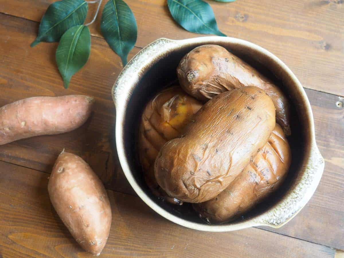 A brown bowl of cooked Instant Pot sweet potatoes.