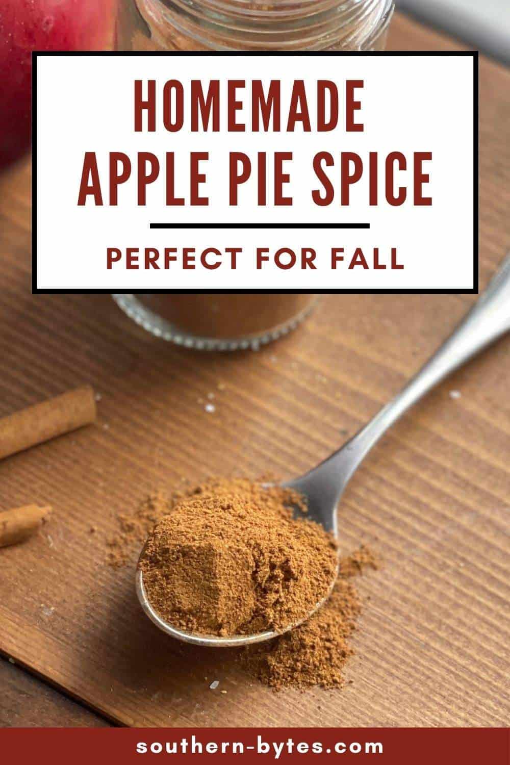 A pin image of a spoonful of homemade apple pie spice mix.