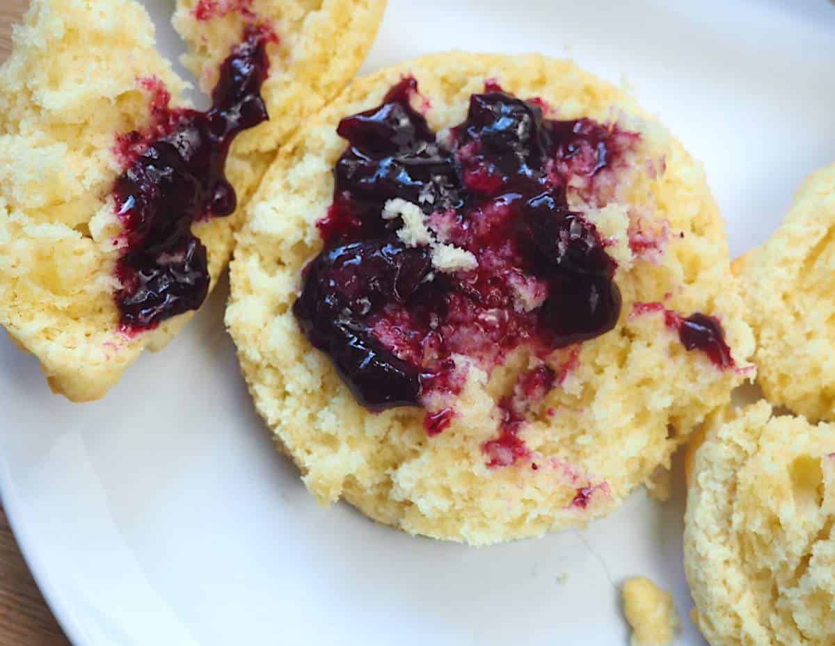 A drop biscuit with instant pot blueberry jam on top.