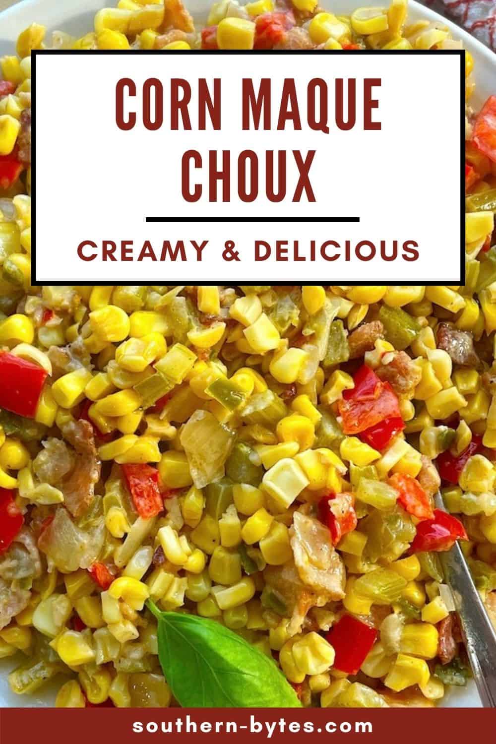 A pin image of a bowl of corn maque choux up close.