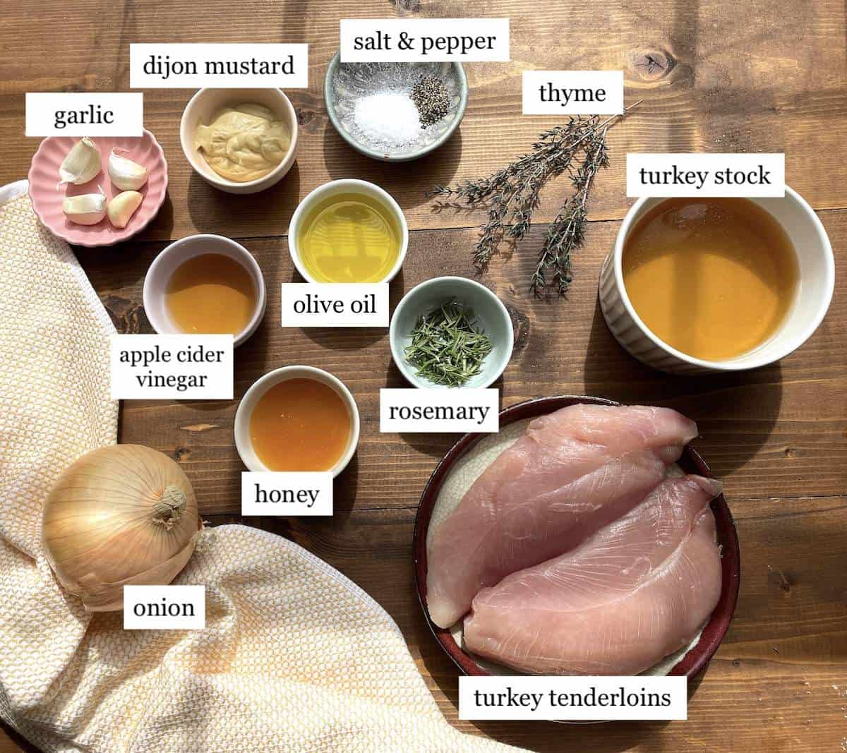The ingredients needed to make crockpot turkey tenderloins, laid out and labeled.