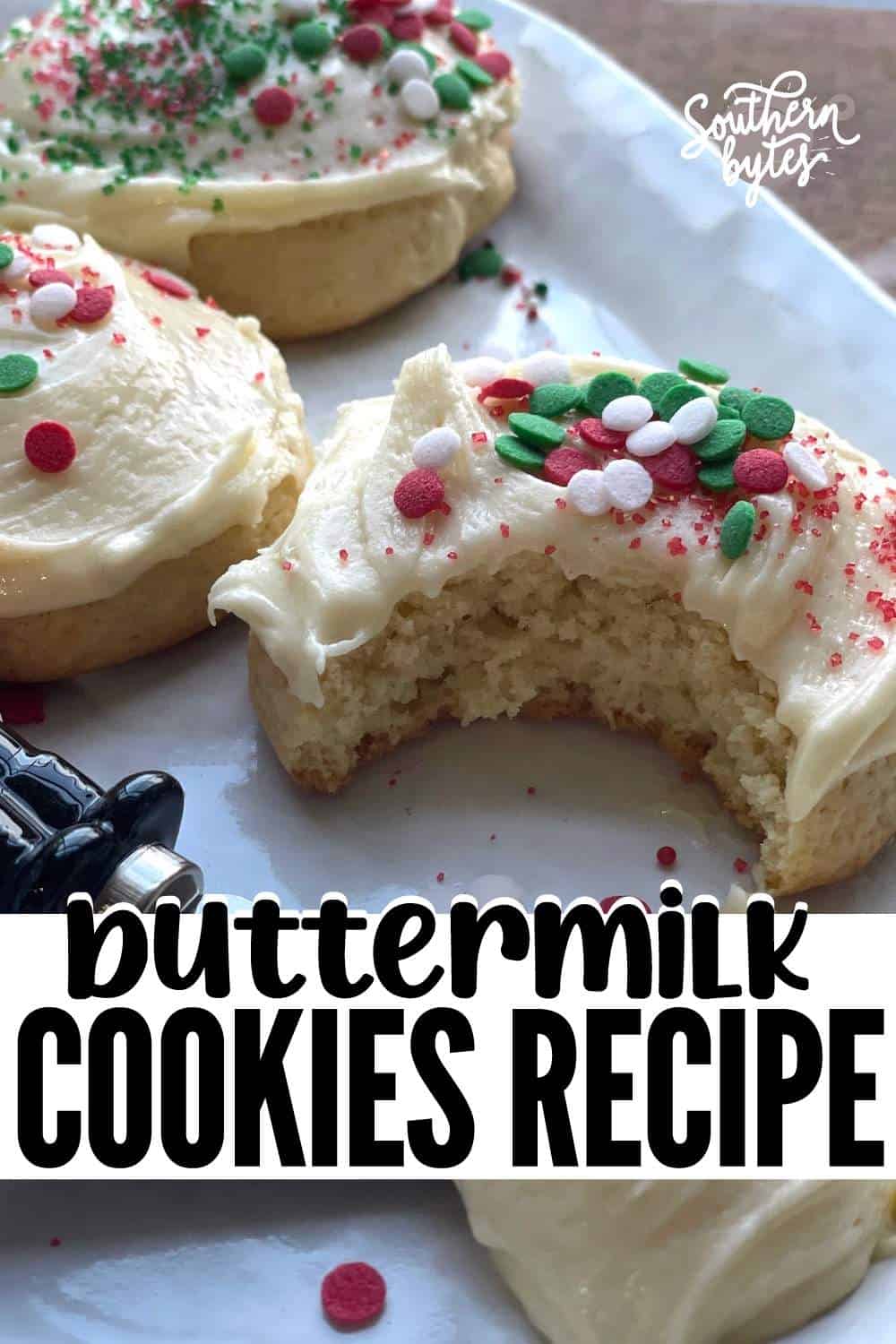 A pin image of frosted buttermilk cookies with Christmas sprinkles and nutcracker knives with extra frosting.