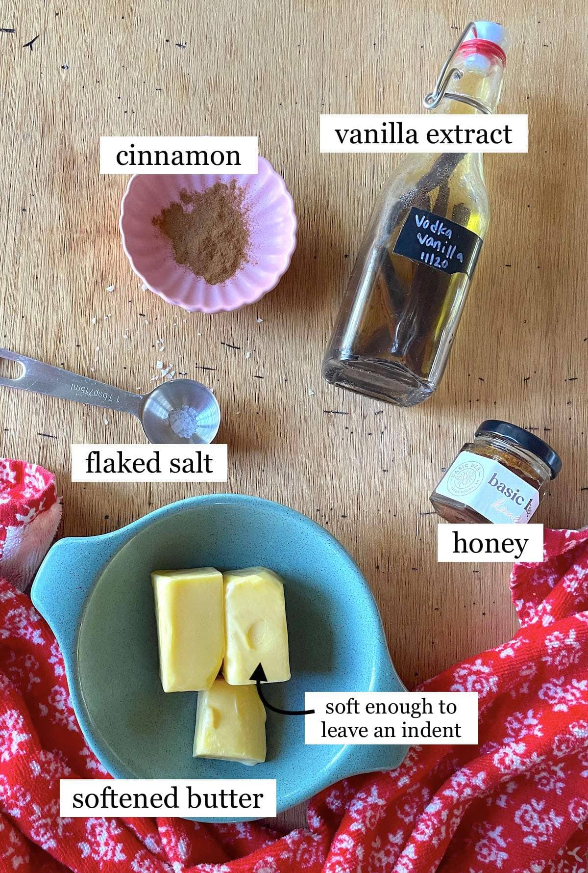 The ingredients in honey butter, laid out in small bowls and labeled.