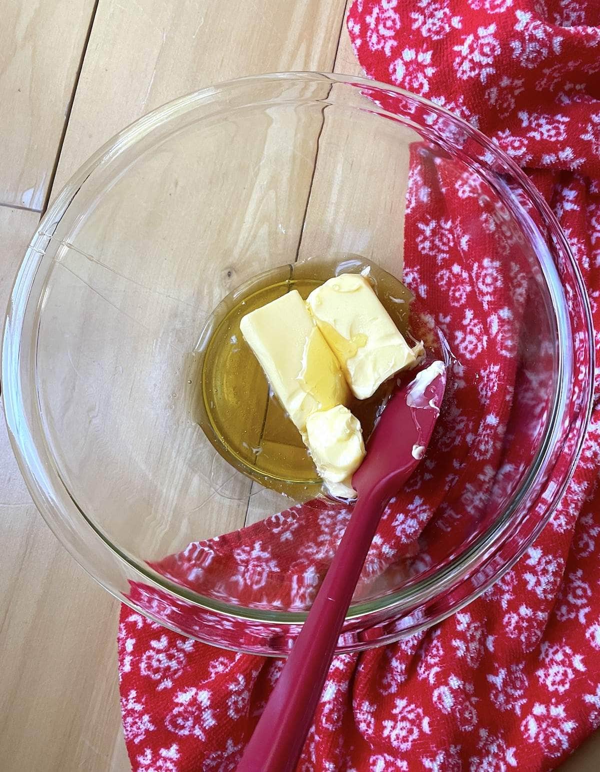 A small bowl of butter and honey, showing how to make honey butter.