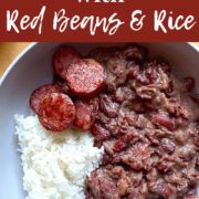 A pin image of a bowl of red beans and rice for What to Serve with Red Beans and Rice.