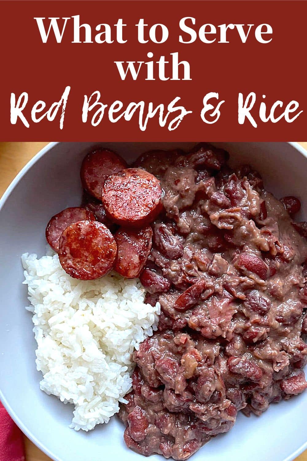 A pin image of a bowl of red beans and rice for What to Serve with Red Beans and Rice.