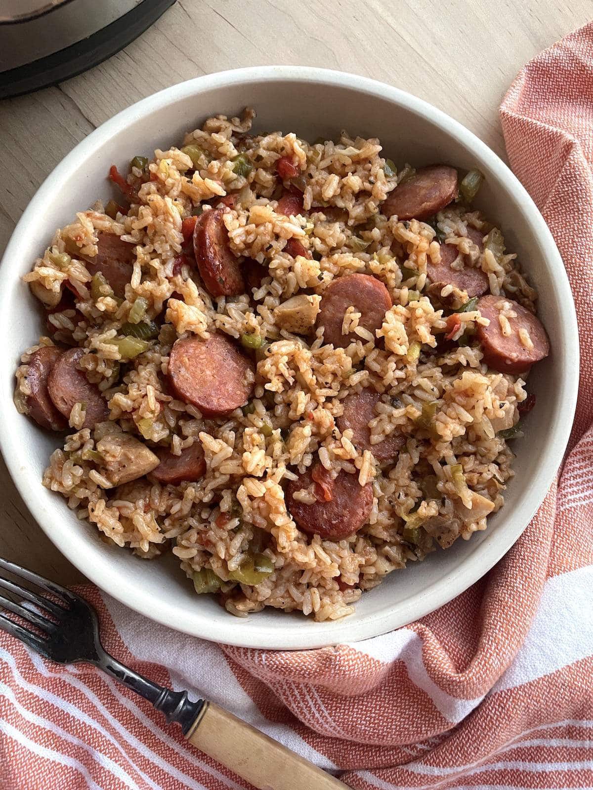 A bowl of instant pot jambalaya loaded with andouille sausage.